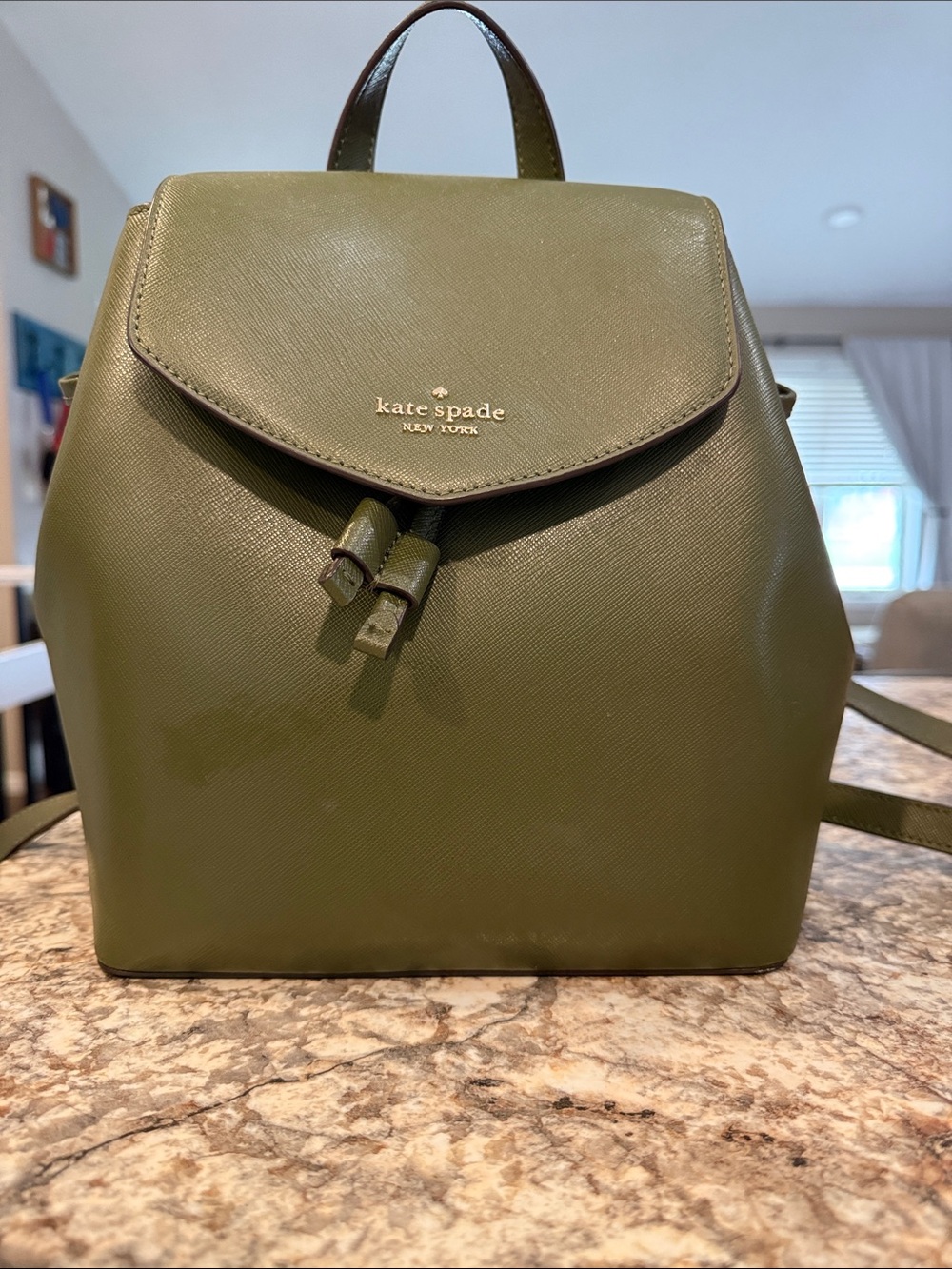 kate spade olive green saffiano leather backpack with gold logo
